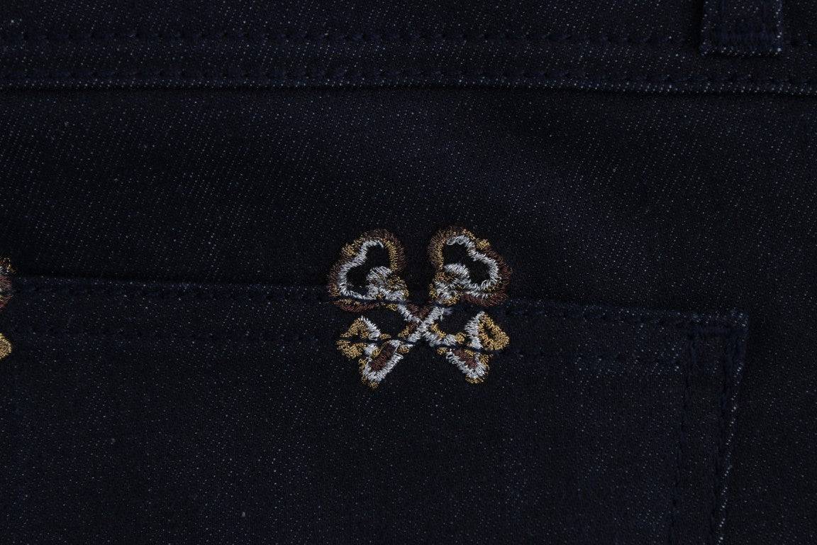 Jeans KATE slim bleu brodé avec broderies de clés de Dolce & Gabbana
