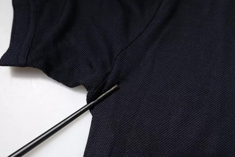 Polo en soie bleu à col et manches courtes de Dolce &amp; Gabbana