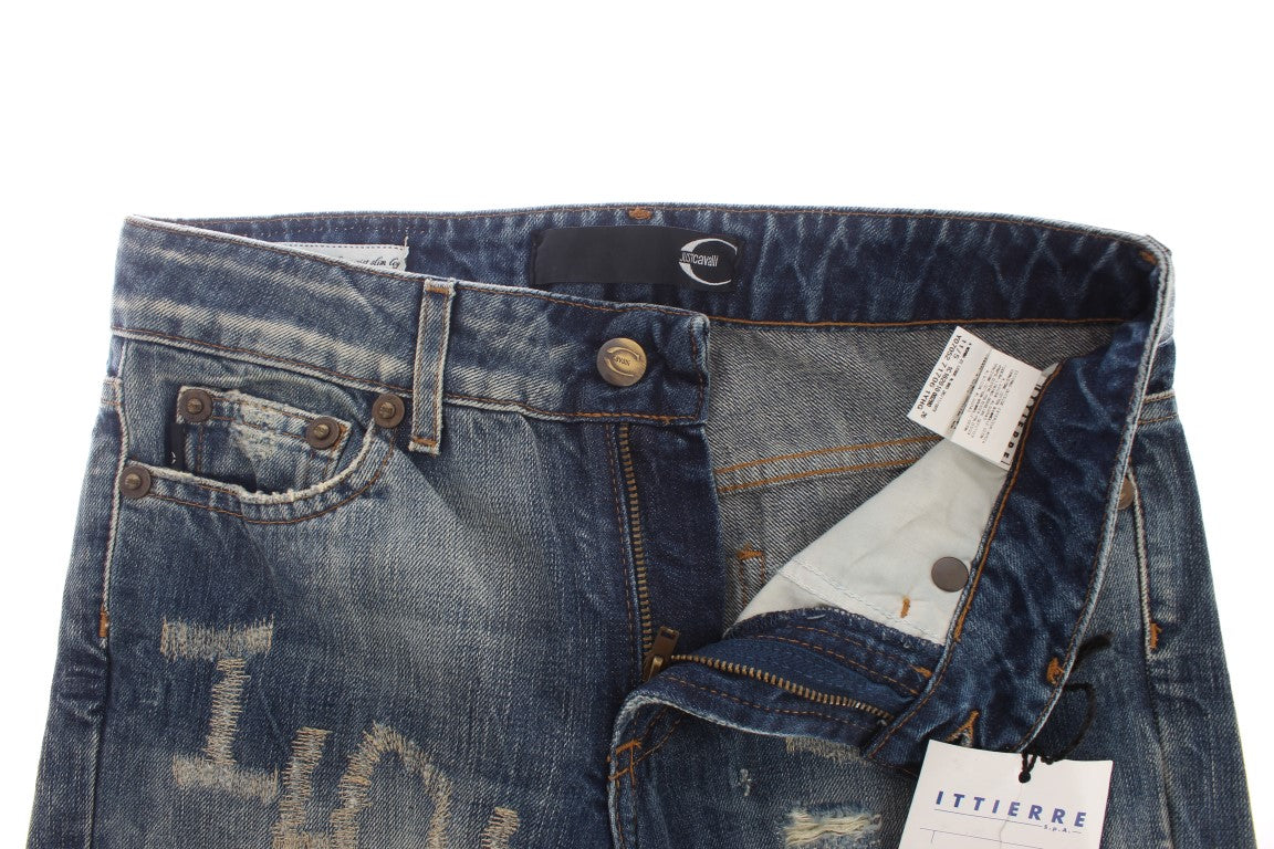 Jeans droits en coton délavé bleu avec déchirures de Cavalli