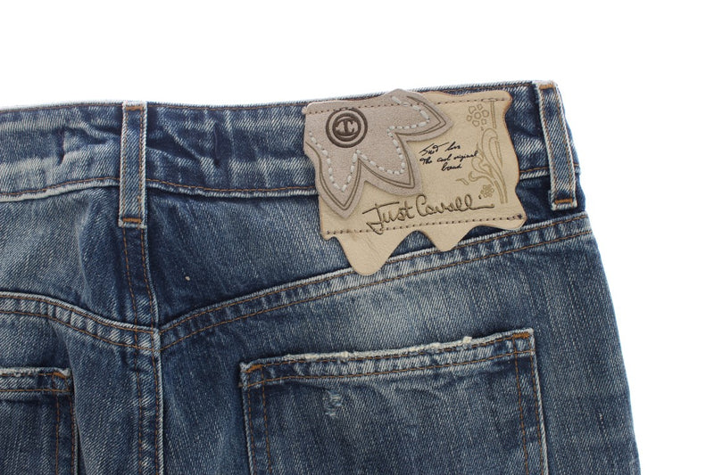 Jeans droits en coton délavé bleu avec déchirures de Cavalli