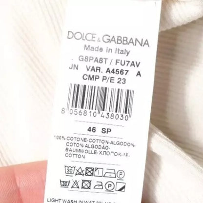 Débardeur Dolce & Gabbana en coton blanc cassé, sans manches, avec col rond.