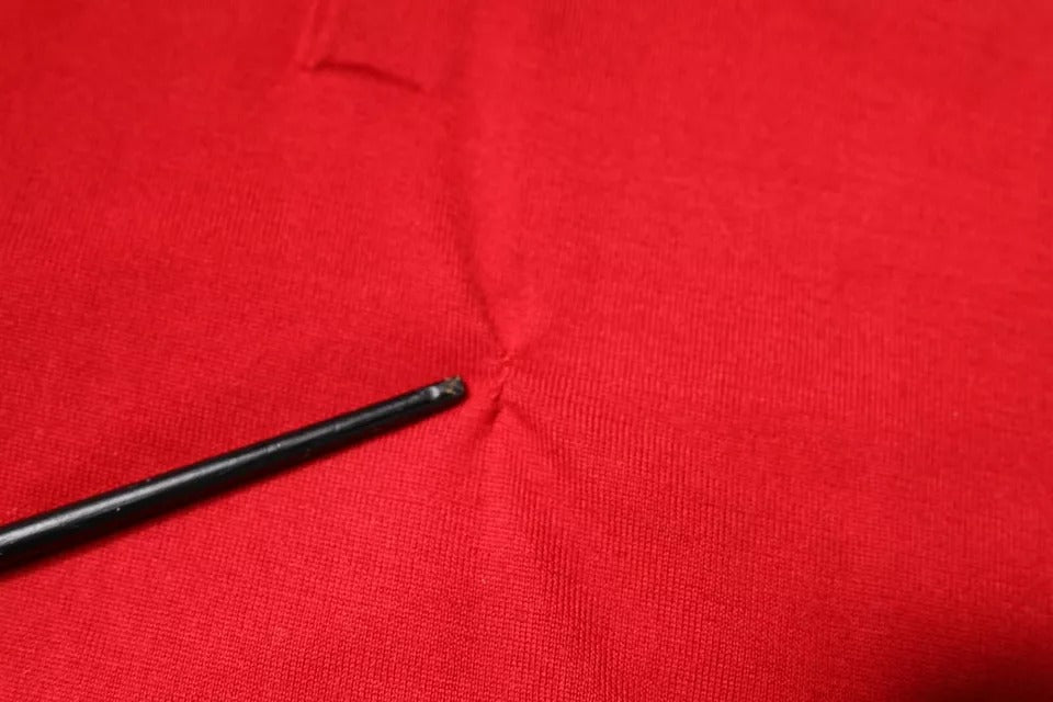 Pull en cachemire rouge à col montant de Dolce &amp; Gabbana