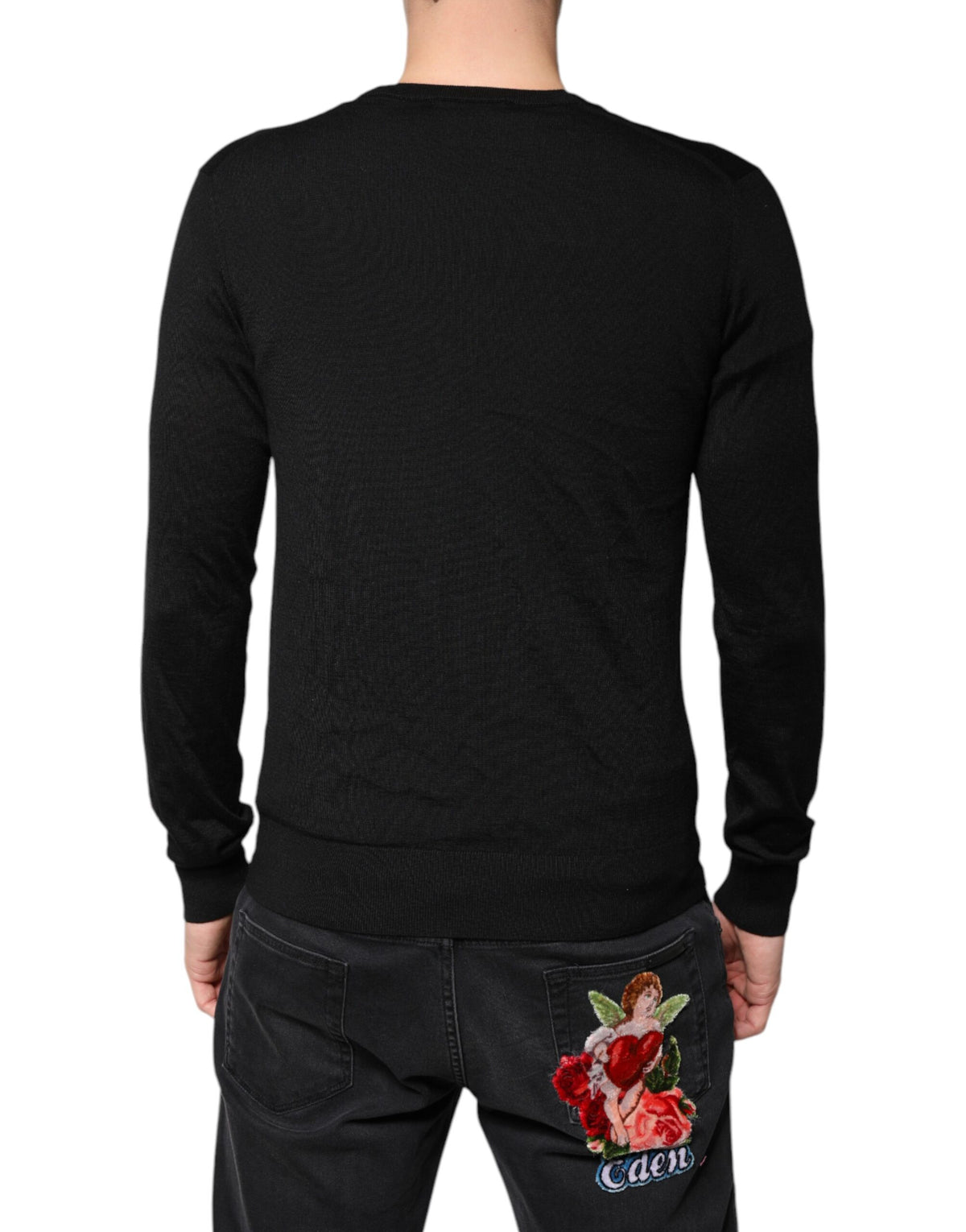 Pull en cachemire noir à boutons de Dolce &amp; Gabbana