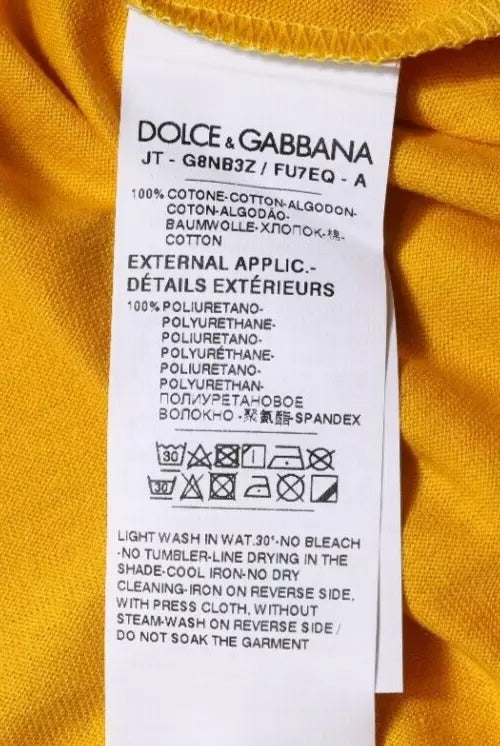 Dolce &amp; Gabbana T-shirt met ronde hals, korte mouwen en logo in donkergeel.