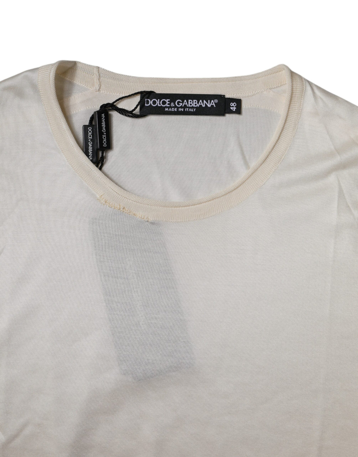 T-shirt Dolce &amp; Gabbana en soie blanche cassée, col rond, manches courtes.