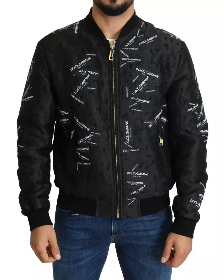 Veste bomber à fermeture éclair intégrale en brocart noir avec logo Dolce & Gabbana.