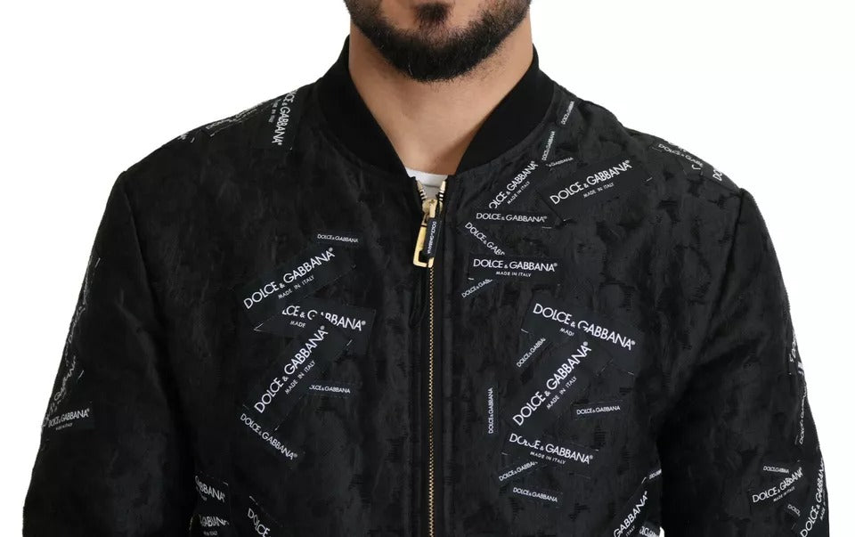 Veste bomber à fermeture éclair intégrale en brocart noir avec logo Dolce & Gabbana.