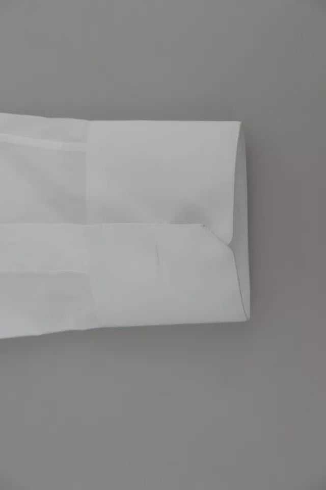 Chemise habillée en coton blanc Dolce & Gabbana, col doré.