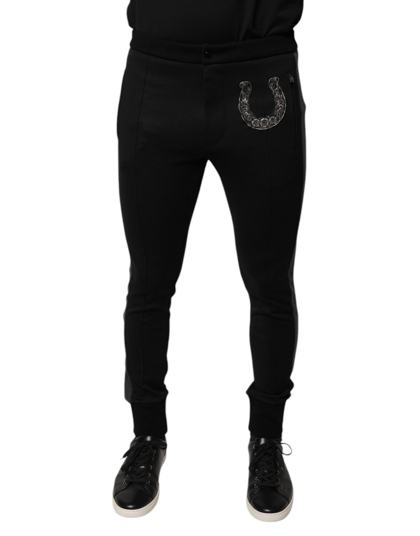 Pantalon slim en laine noir à ornements en forme de fer à cheval de Dolce &amp; Gabbana