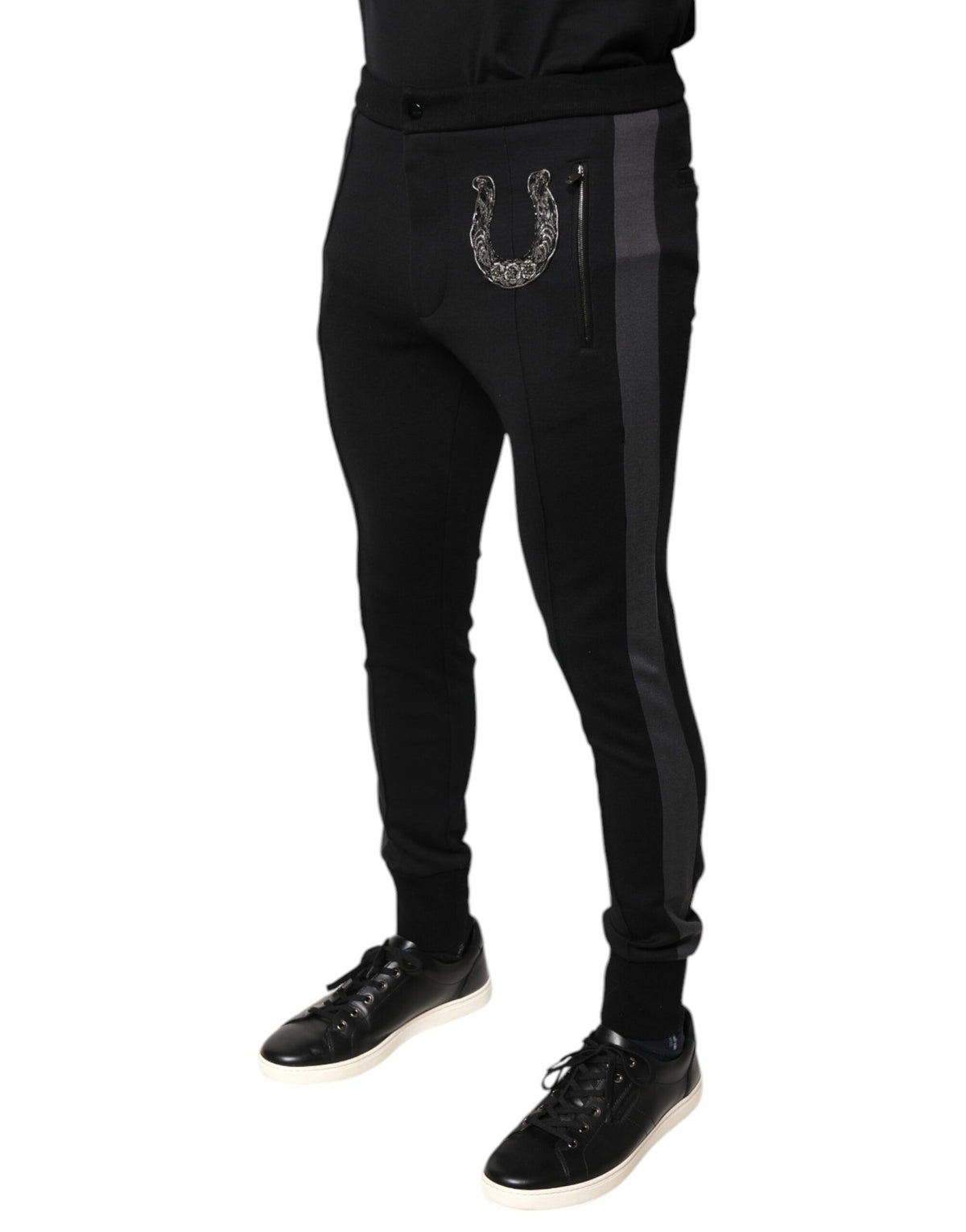 Pantalon slim en laine noir à ornements en forme de fer à cheval de Dolce &amp; Gabbana