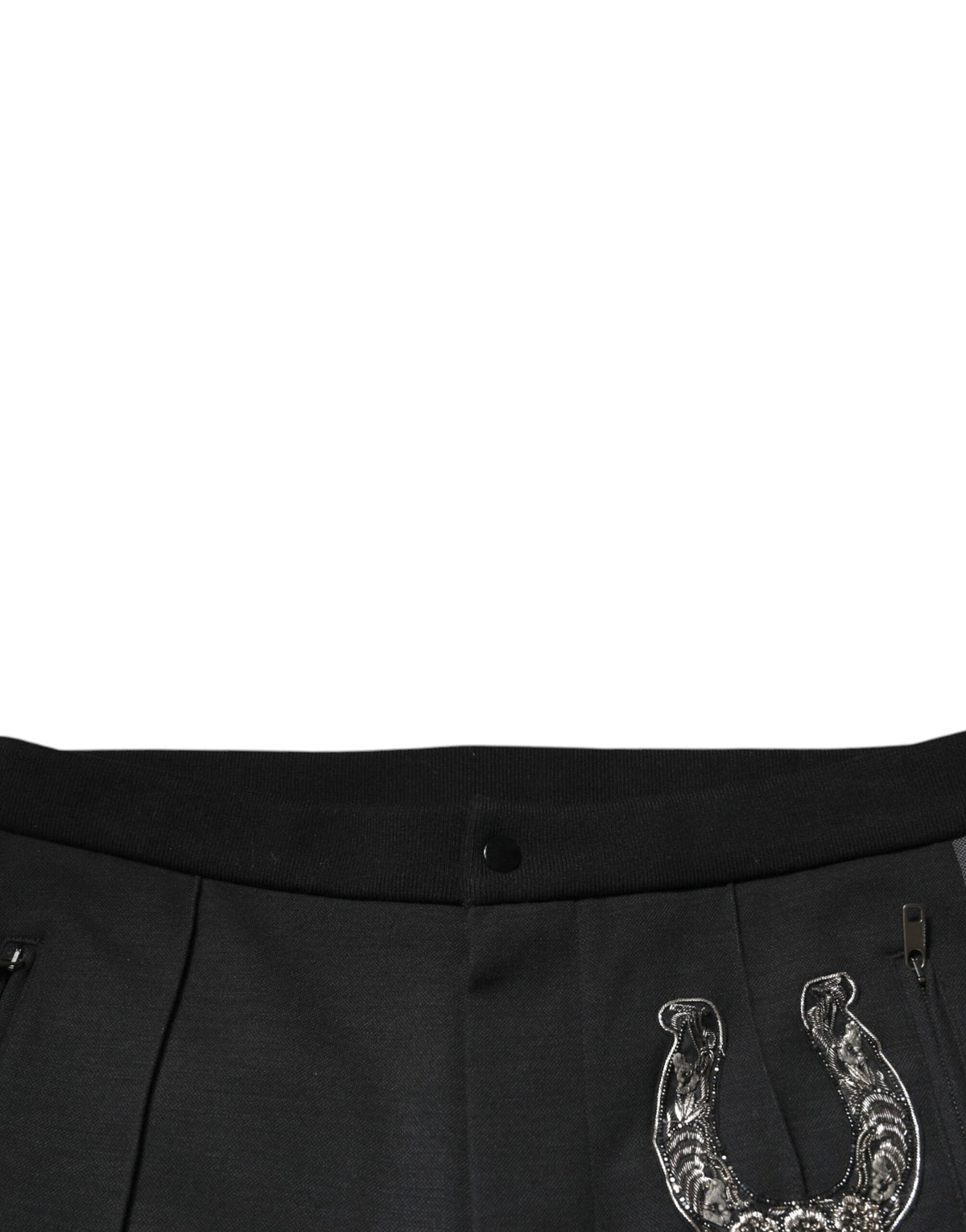 Pantalon slim en laine noir à ornements en forme de fer à cheval de Dolce &amp; Gabbana