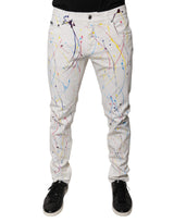 Jeans skinny en jean blanc à imprimé éclaboussures de couleur de Dolce &amp; Gabbana