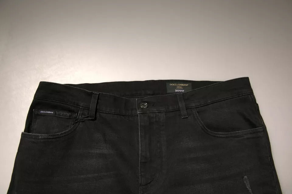 Jeans skinny en coton noir déchiré avec logo Dolce &amp; Gabbana