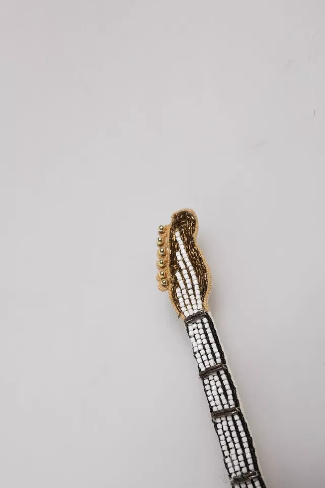 Broche en Or et Laiton Dolce & Gabbana en Forme de Guitare