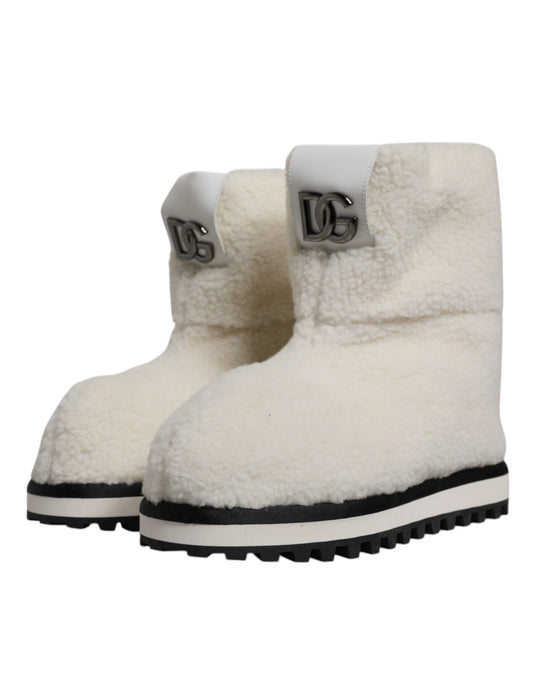 Bottines mi-mollet en daim blanc avec logo et rembourrage de Dolce & Gabbana