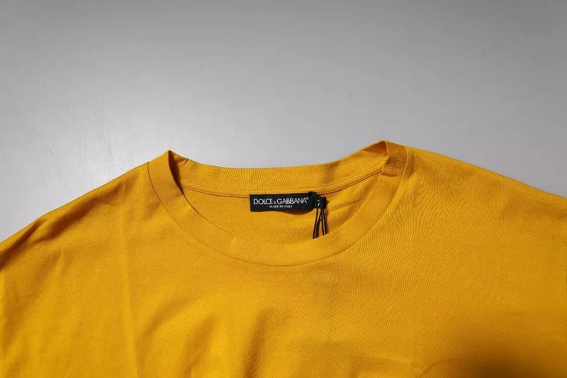 Dolce &amp; Gabbana T-shirt voor heren met ronde hals, van katoen, in donkergeel met logo.