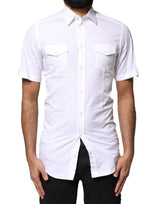 Polo homme blanc à boutons dorés, style décontracté, Dolce &amp; Gabbana.
