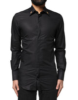 Chemise de ville homme Dolce &amp; Gabbana noire, ornée de croix dorées.