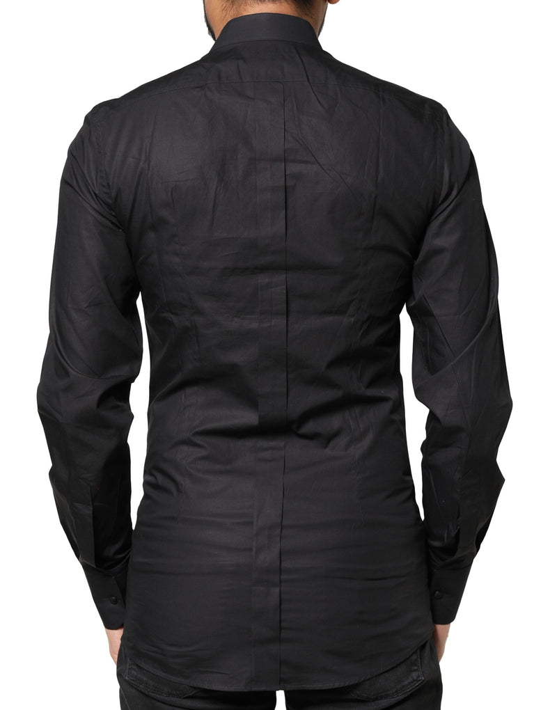 Chemise de ville homme Dolce &amp; Gabbana noire, ornée de croix dorées.