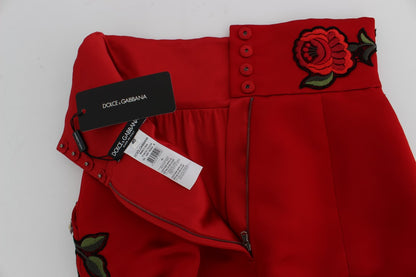 Shorts en soie rouge à motifs roses et cristaux de Dolce & Gabbana