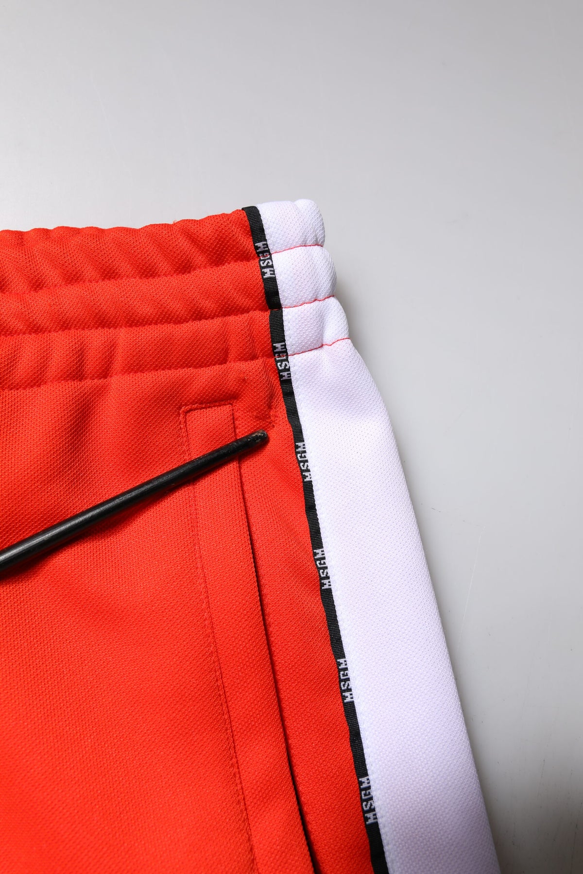 MSGM Pantalon de jogging homme rouge et blanc, taille mi-hauteur