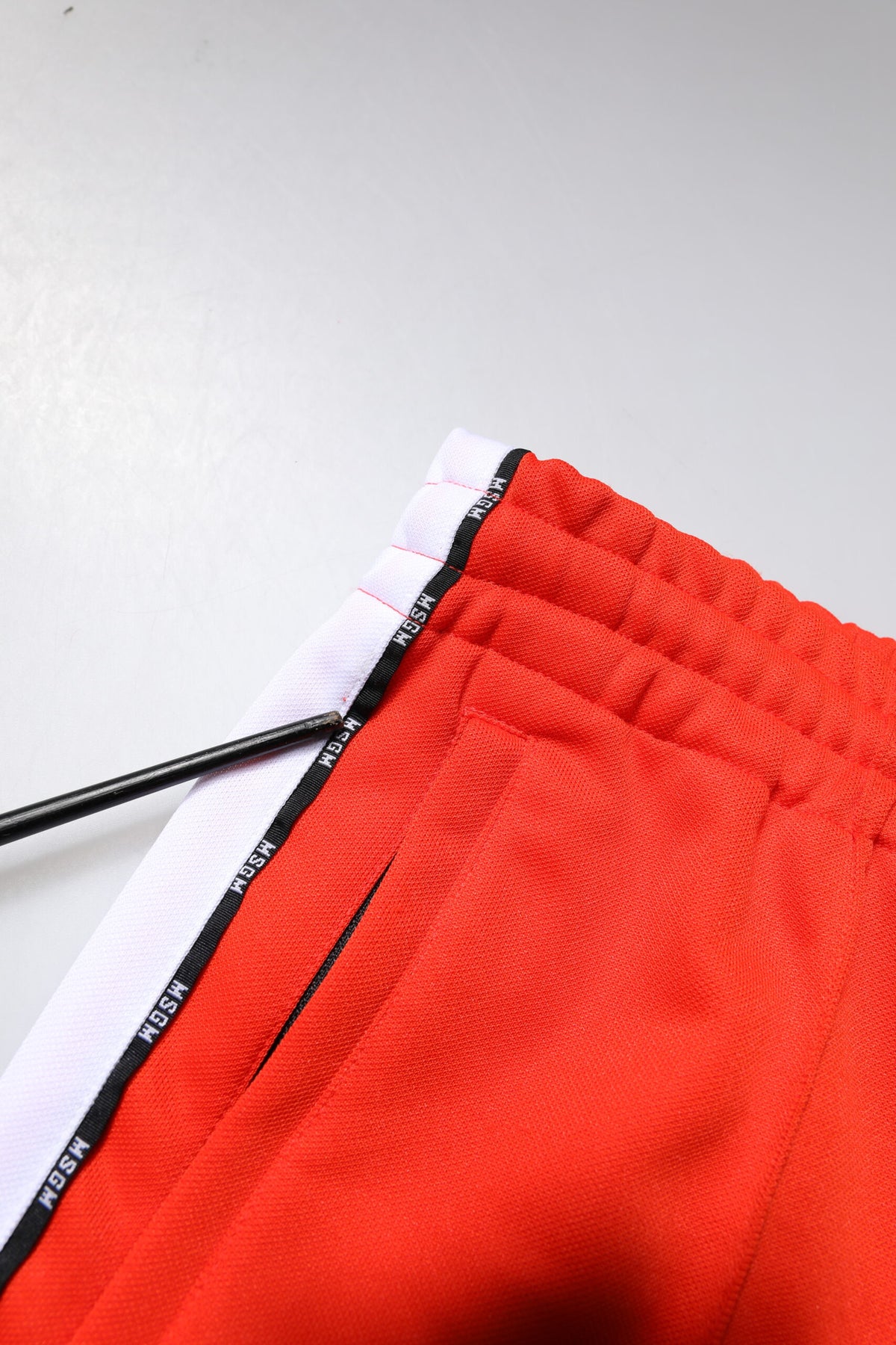 MSGM Pantalon de jogging homme rouge et blanc, taille mi-hauteur