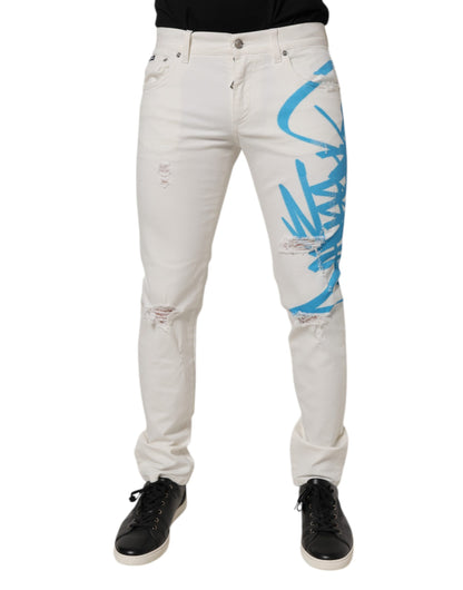 Jeans skinny en jean blanc délavé et dépareillé avec graffitis de Dolce &amp; Gabbana