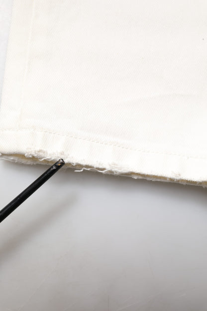 Jeans skinny en jean blanc délavé et dépareillé avec graffitis de Dolce & Gabbana