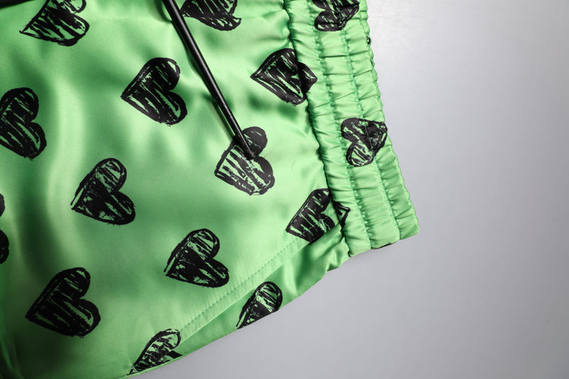 Dolce &amp; Gabbana groene cargo bermuda shorts met hartjesprint voor heren