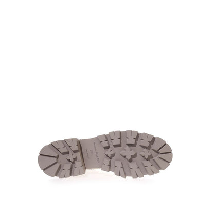 Bottines en cuir gris chic Alexander McQueen pour une allure élégante.