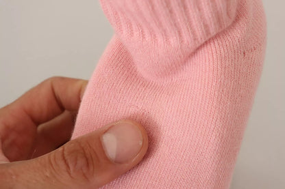 Bottines à talons compensés en daim rose avec logo GCDS, à porter comme chaussettes.