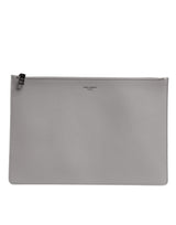 Pochette zippée en cuir gris massif Dolce & Gabbana pour homme avec logo DG