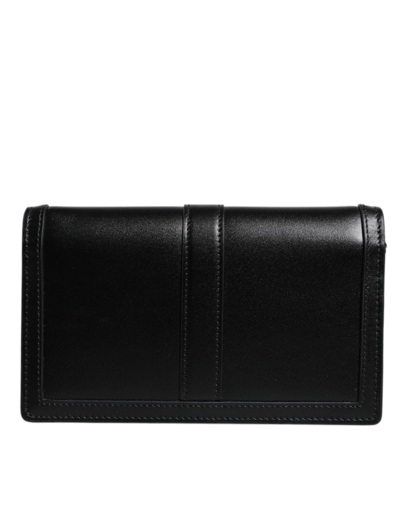 Sac à bandoulière croisé en cuir de veau noir Versace