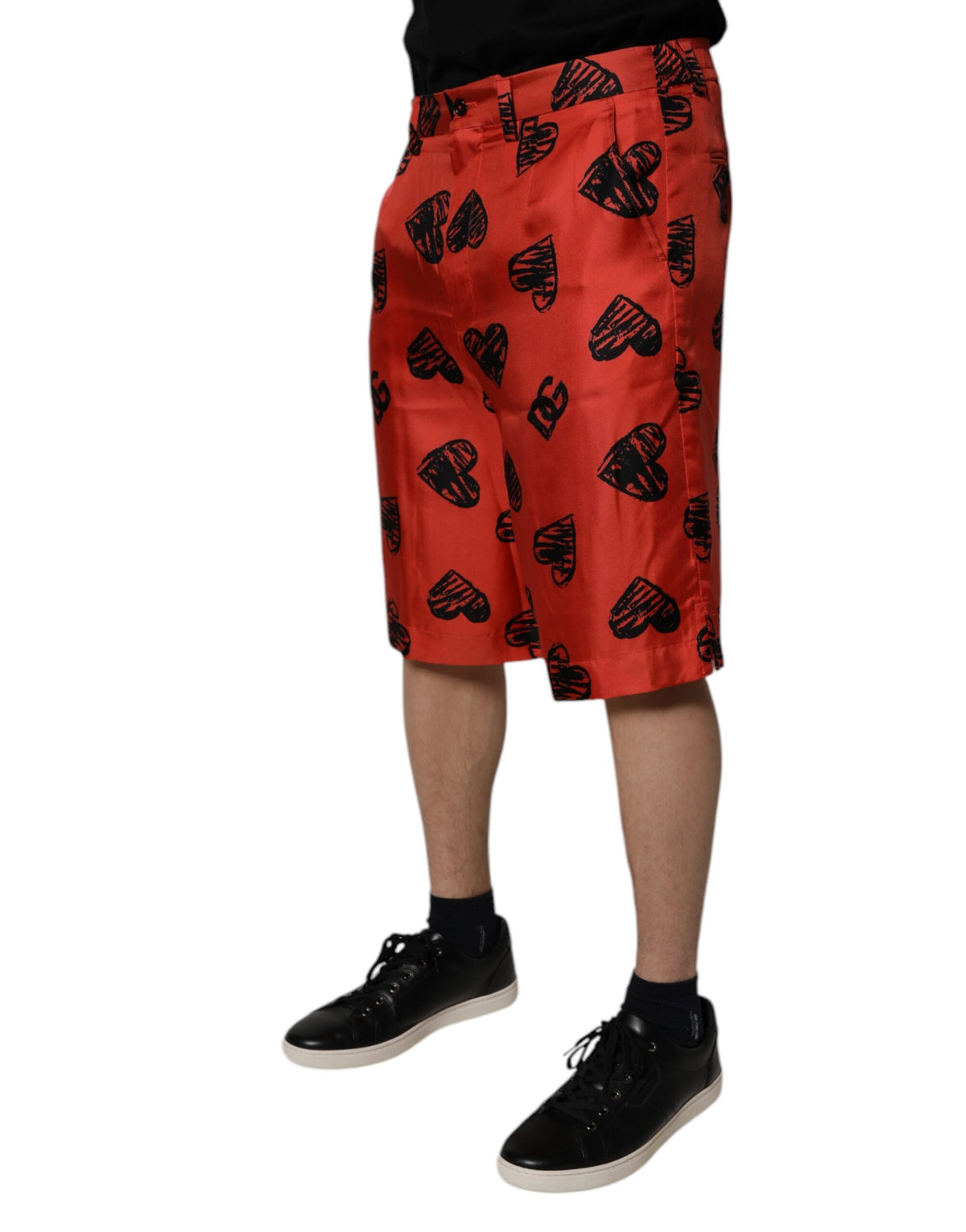 Shorts Bermuda en soie orange à imprimé cœur de Dolce &amp; Gabbana