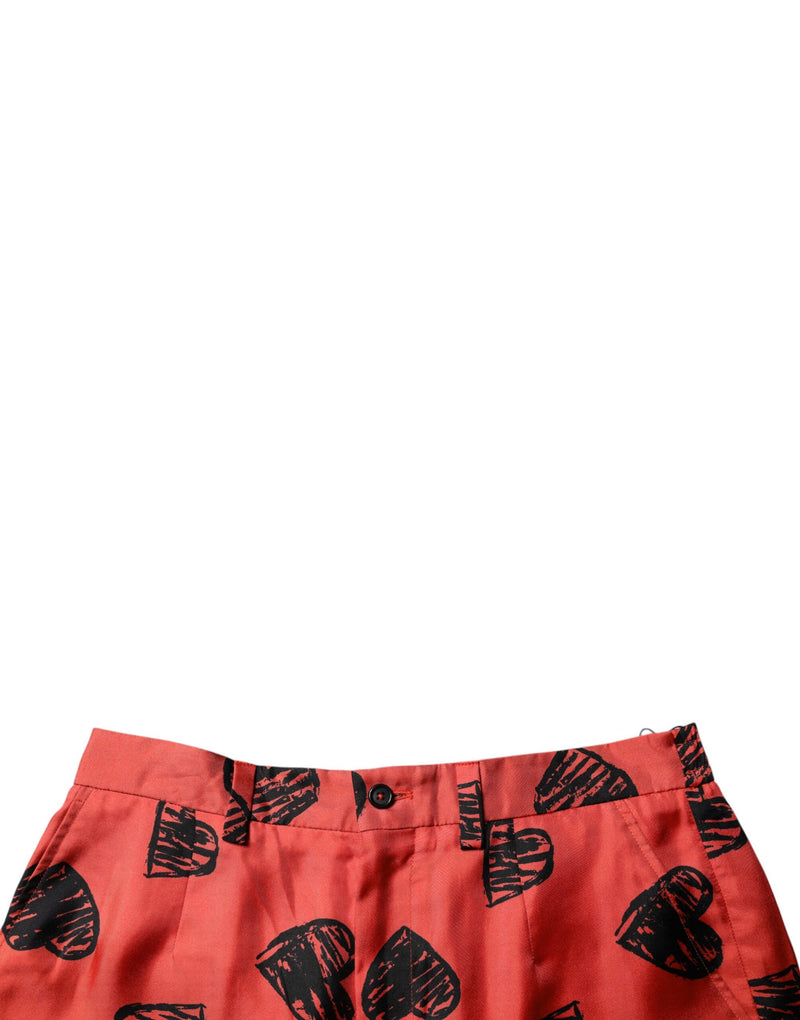 Dolce &amp; Gabbana Bermuda shorts van oranje zijde met hartjesprint