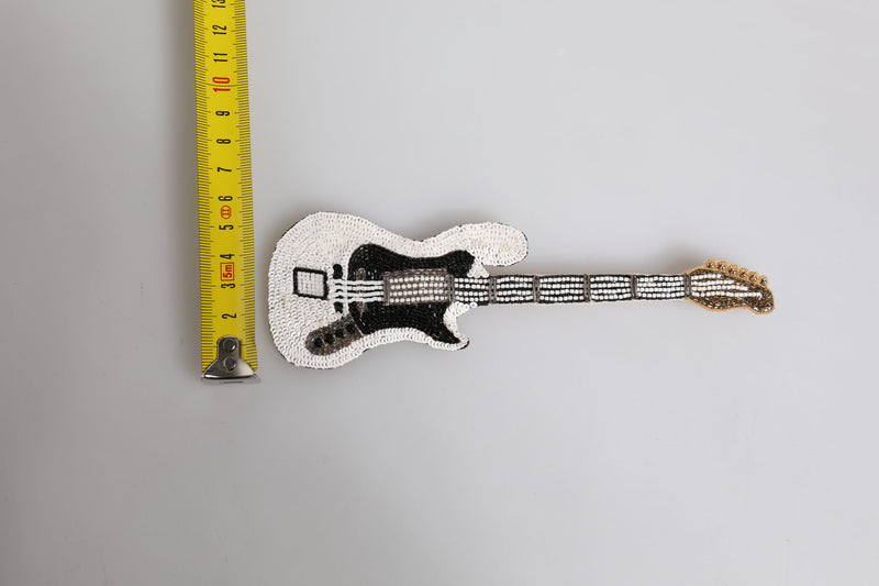 Broche guitare perlée en laiton doré avec logo Dolce & Gabbana