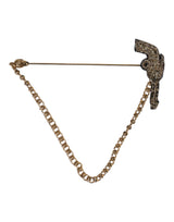 Broche revolver Dolce & Gabbana en laiton doré noir et cuivre