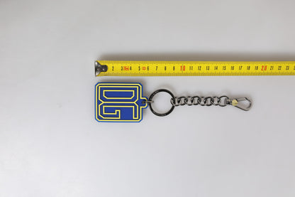 Porte-clés Dolce & Gabbana pour homme, logo DG en caoutchouc bleu et jaune, argenté