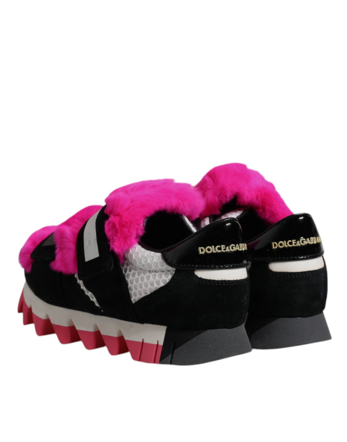 Sneakers Dolce & Gabbana noires et roses, ornées de fourrure.