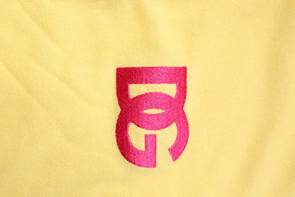 Polo à col boutonné en coton jaune avec logo Dolce &amp; Gabbana