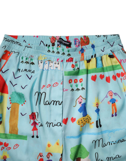 Dolce & Gabbana lichtblauwe broek met brede pijpen, middelhoge taille en tekening.