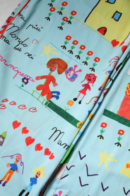 Dolce & Gabbana lichtblauwe broek met brede pijpen, middelhoge taille en tekening.