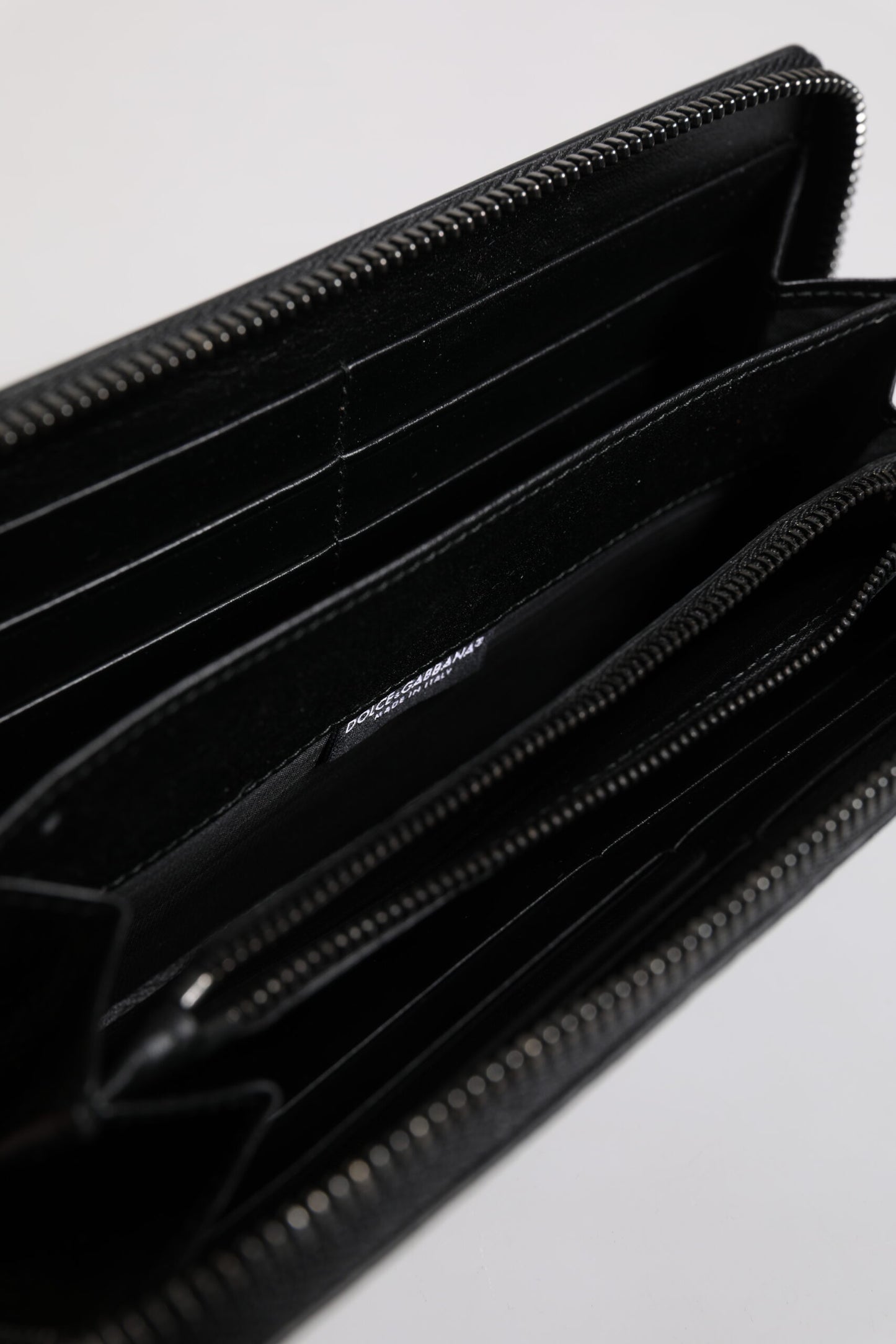 Dolce & Gabbana zwarte leren portemonnee met logo-plaquette en ritssluiting rondom