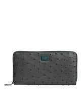 Portefeuille continental zippé Dolce &amp; Gabbana avec plaque logo en autruche verte