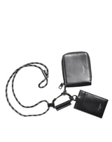 Portefeuille porte-cartes zippé en cuir noir Dolce &amp; Gabbana