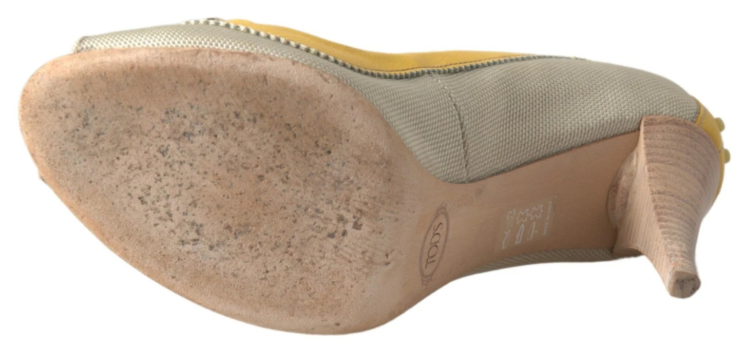 Escarpins à bout ouvert Tod's en jaune et blanc cassé.