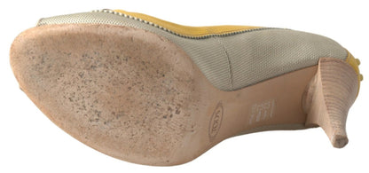 Escarpins à bout ouvert Tod's en jaune et blanc cassé.
