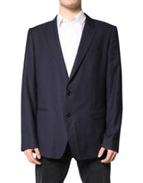 Dolce &amp; Gabbana, costume-blazer noir en laine, à simple boutonnage.