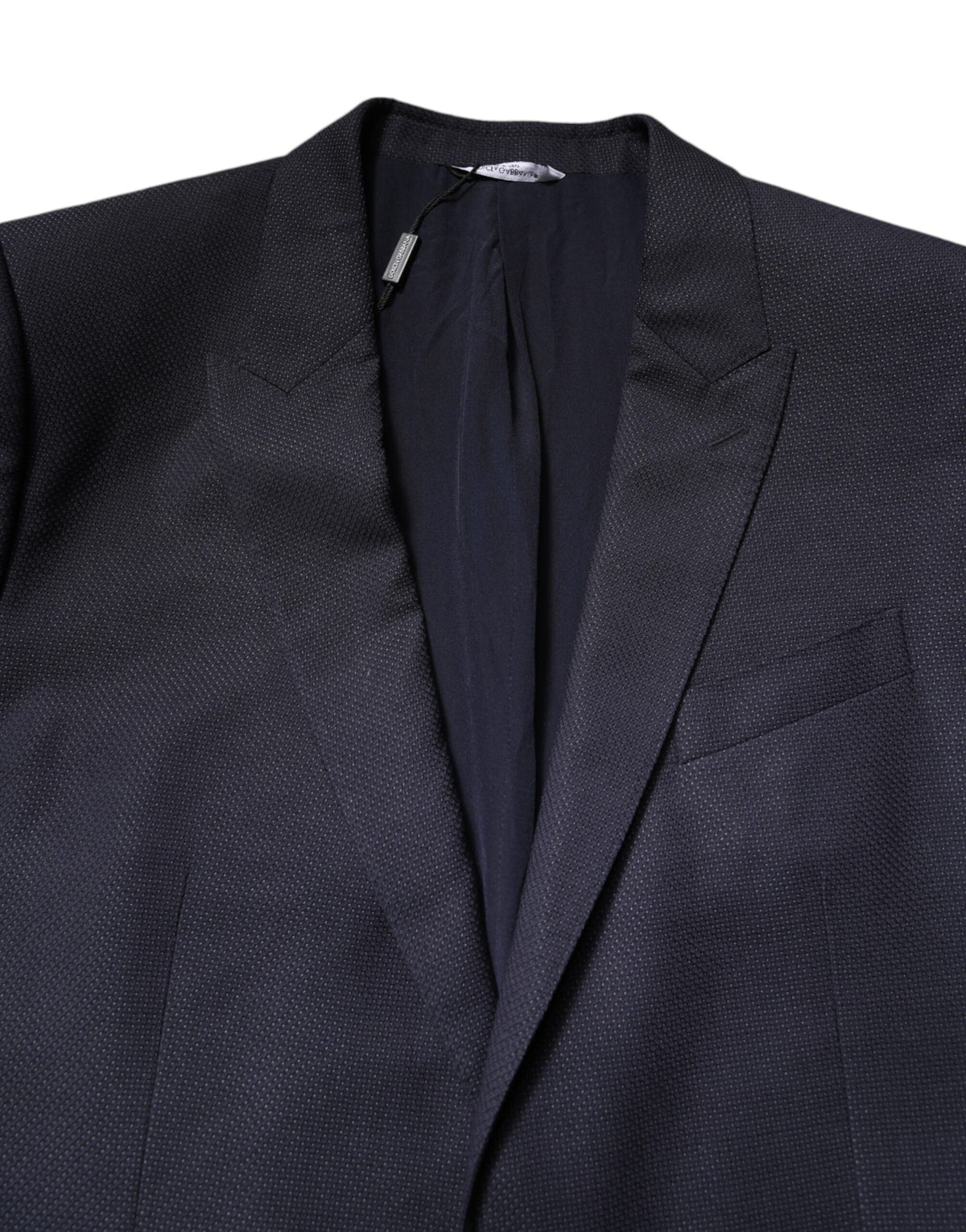 Dolce &amp; Gabbana, costume-blazer noir en laine, à simple boutonnage.