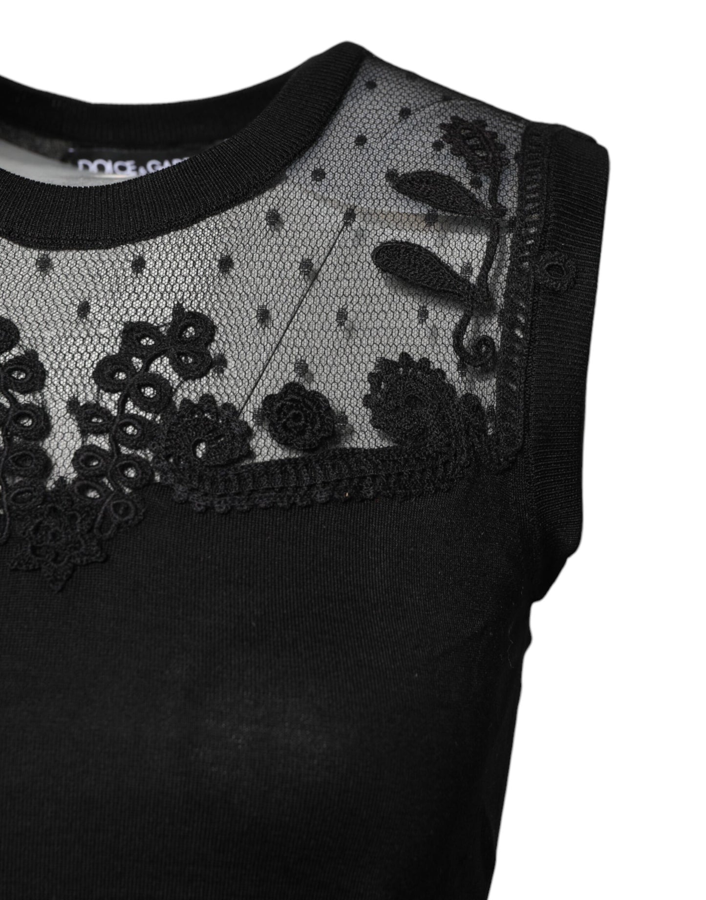 Top noir en dentelle transparente, col rond et sans manches de Dolce & Gabbana